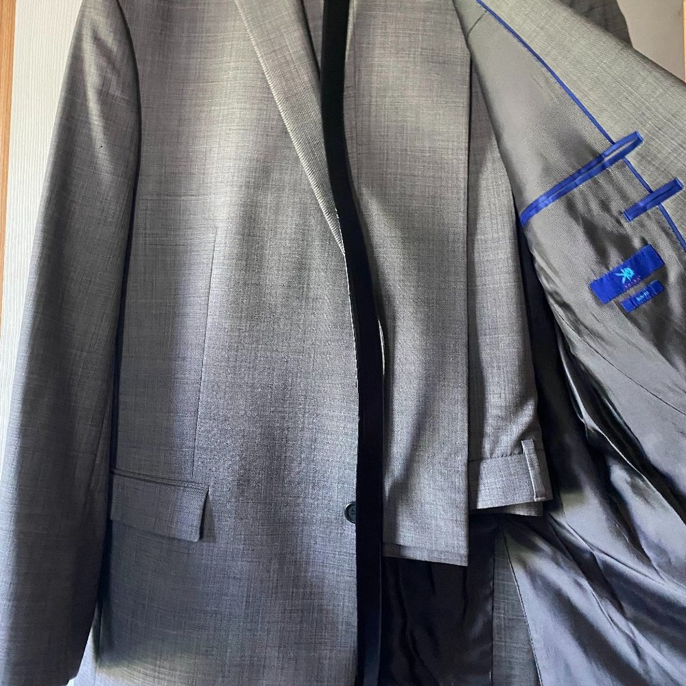 Grey suit, slacks, white shirt, black leather belt. Worn once.